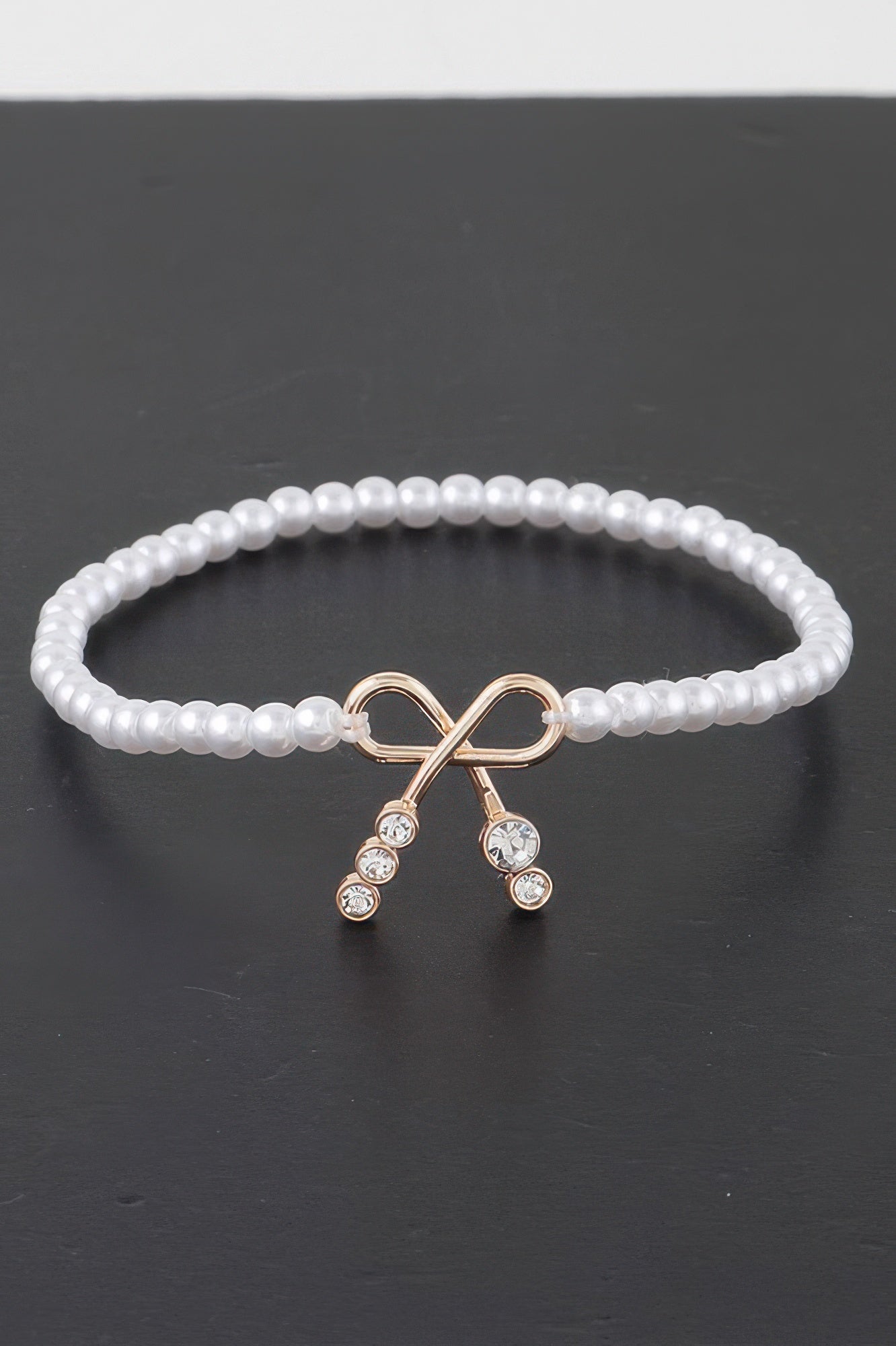 Bracelet de perles fantaisie avec nœud et strass