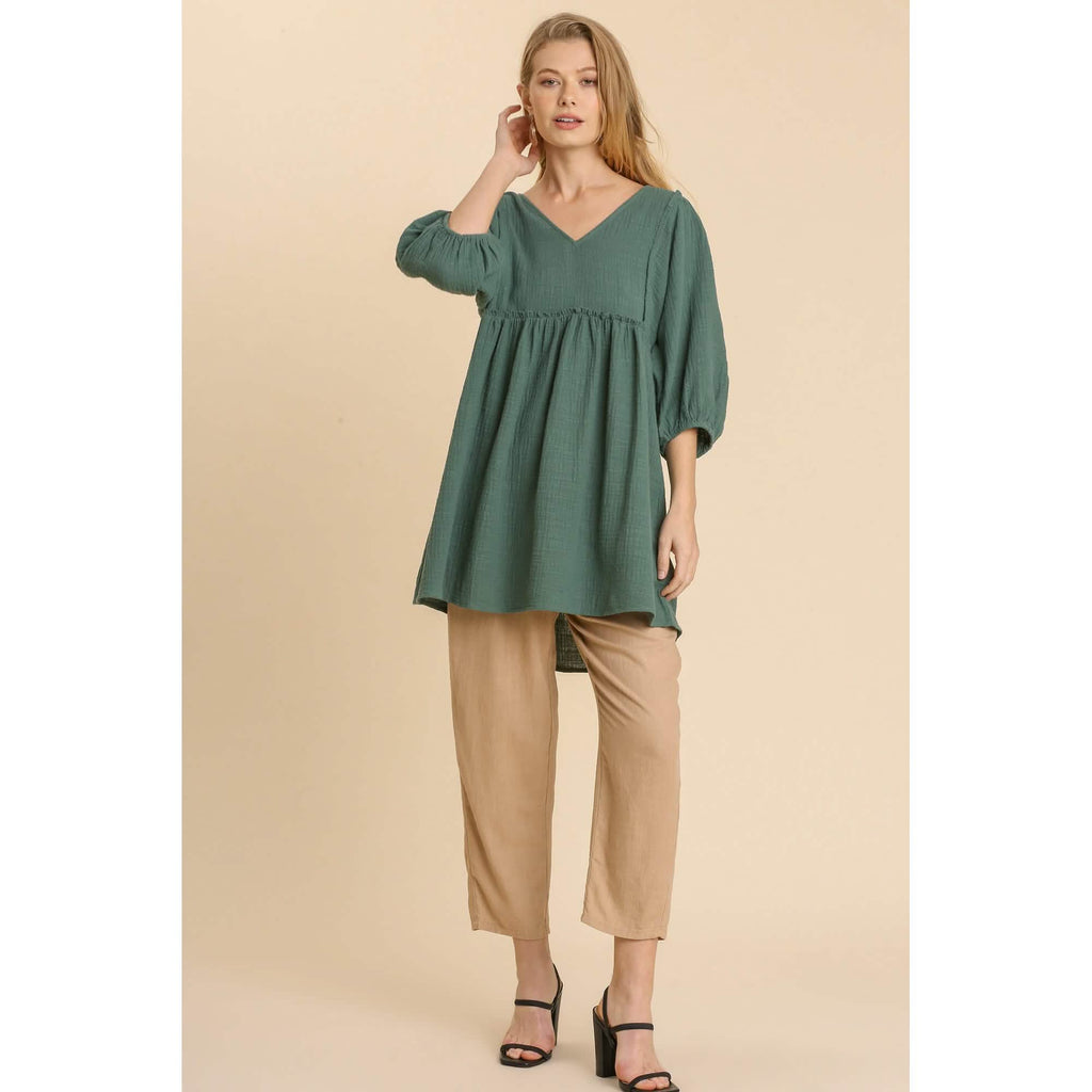 Robe tunique à col en V en gaze flammée avec bords effilochés