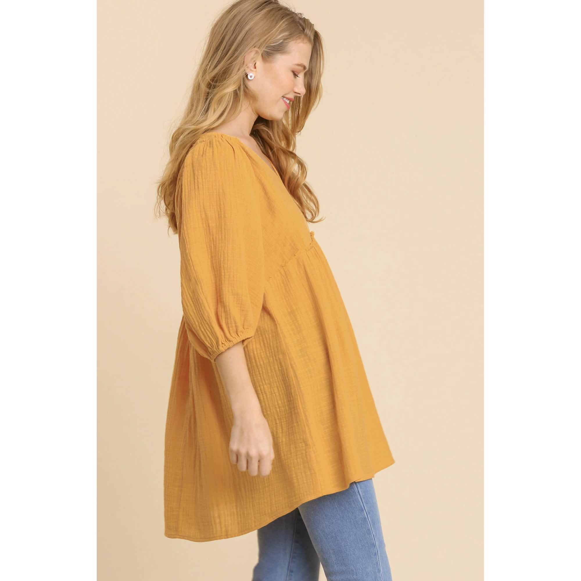 Robe tunique à col en V en gaze flammée avec bords effilochés