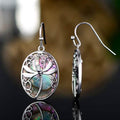 Boucles d'oreilles pendantes libellule en nacre d'abalone bleue véritable