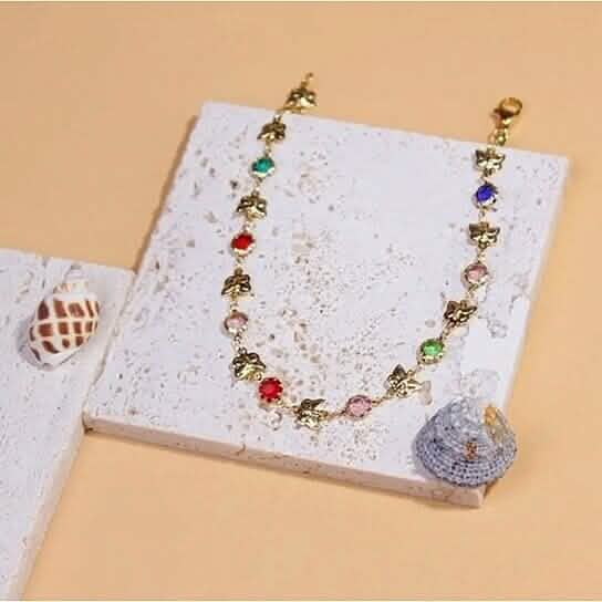 Bracelet de cheville papillon doré avec pierres en cristal multicolores