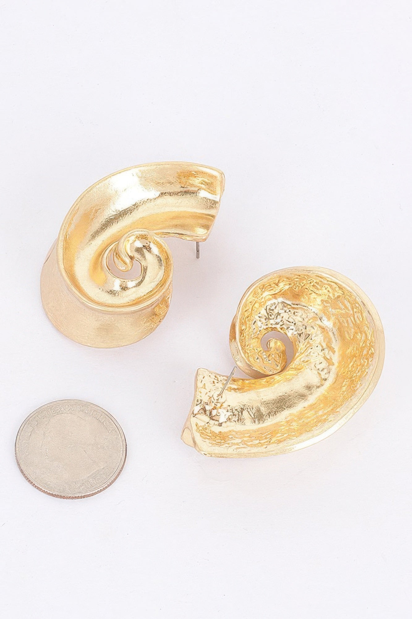 Boucle d'oreille en métal plaqué or