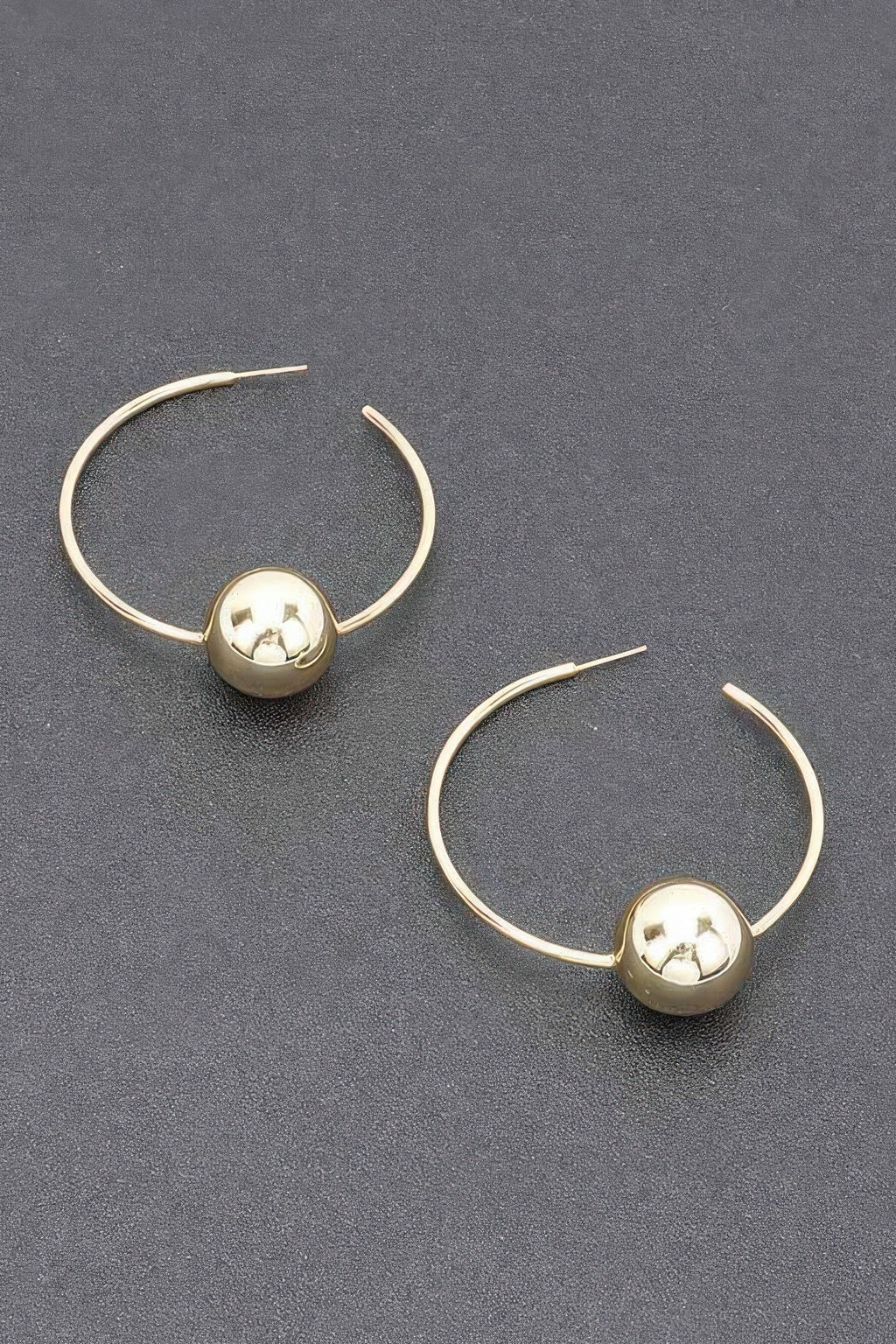 Boucle d'oreille en métal plaqué or