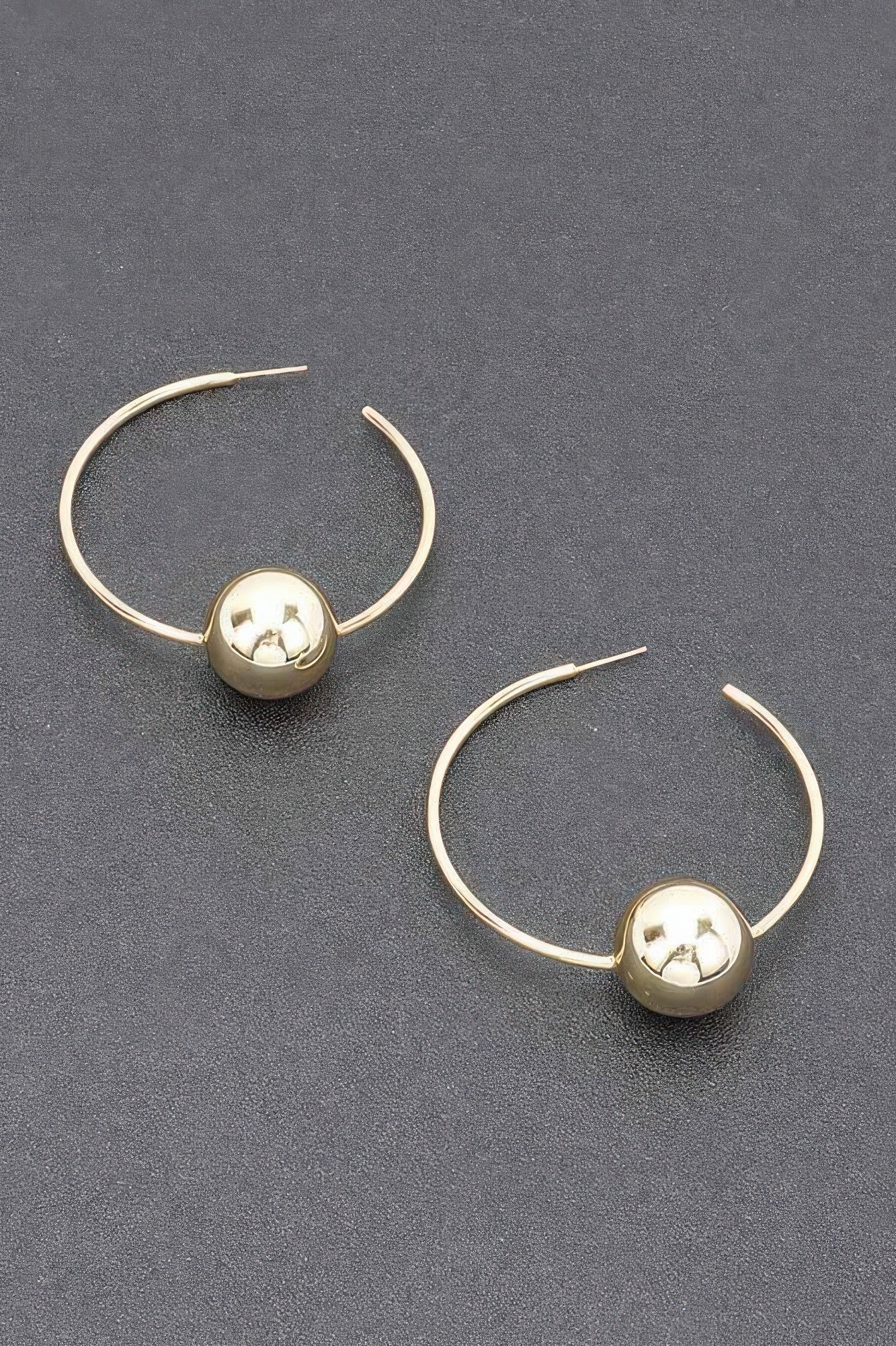 Boucle d'oreille en métal plaqué or