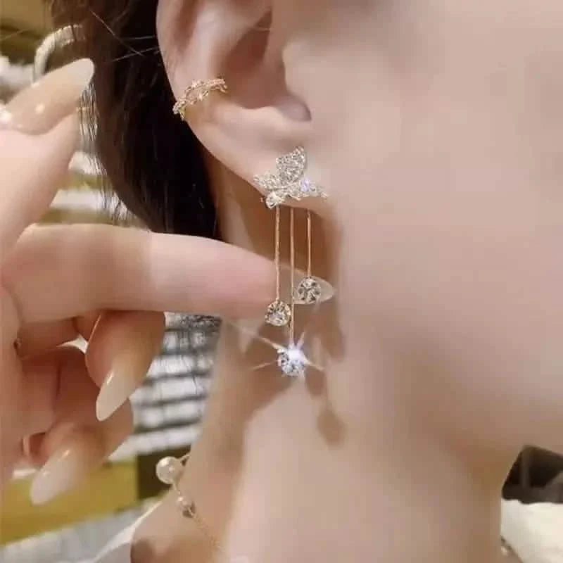 Boucles d'oreilles pendantes en alliage ton or et oxyde de zirconium