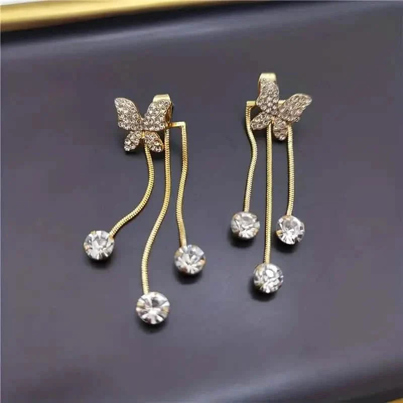 Boucles d'oreilles pendantes en alliage ton or et oxyde de zirconium