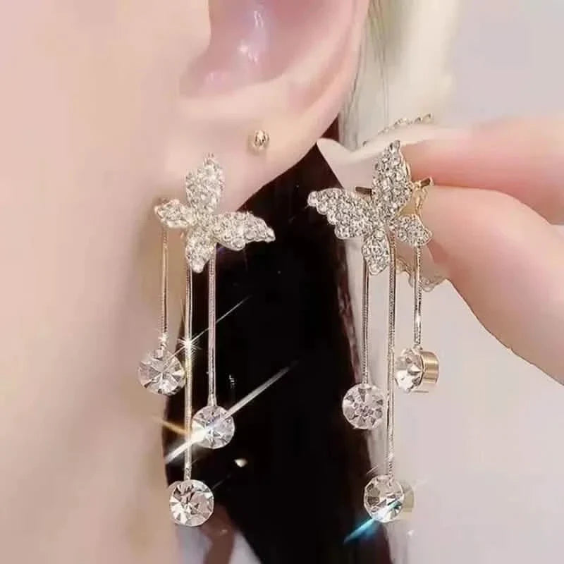 Boucles d'oreilles pendantes en alliage ton or et oxyde de zirconium