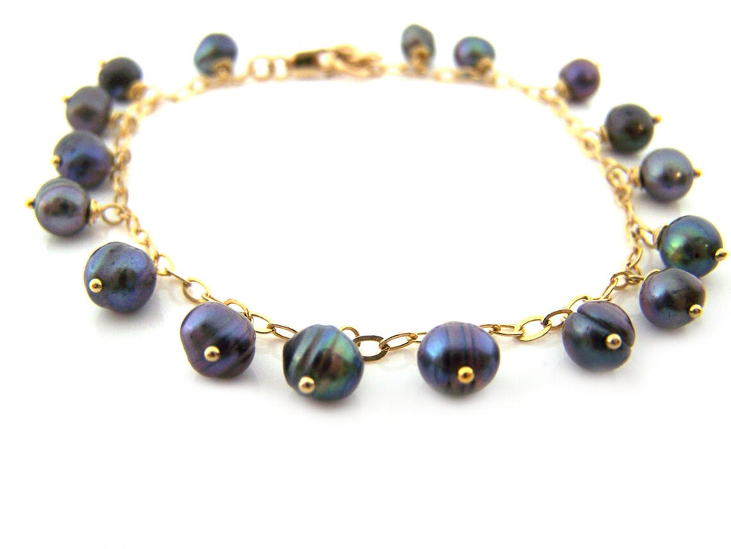 Bracelet fin chaîne remplie or perle d'eau douce paon