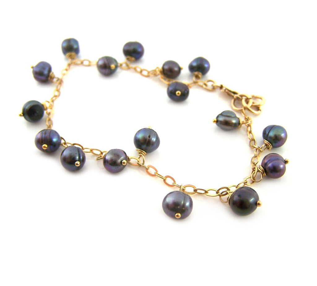 Bracelet fin chaîne remplie or perle d'eau douce paon