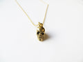 Collier petite tête de mort en or – Plaqué or 14 carats sur chaîne de 40 cm