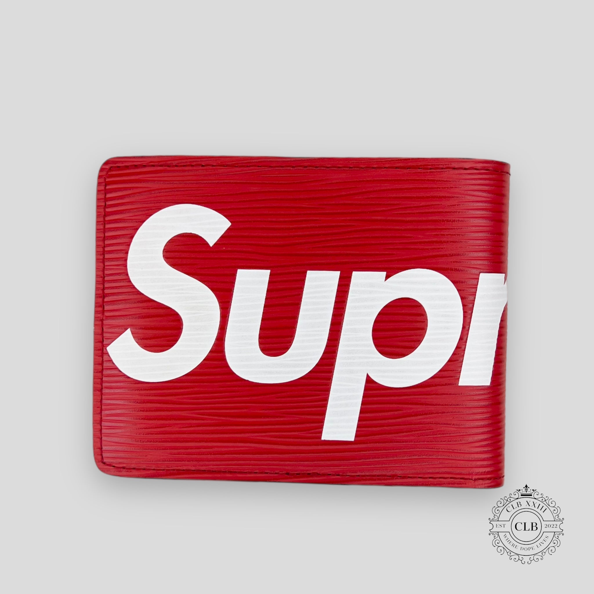 PORTEFEUILLE EN CUIR PLIANT LOUIS VUITTON X SUPREME