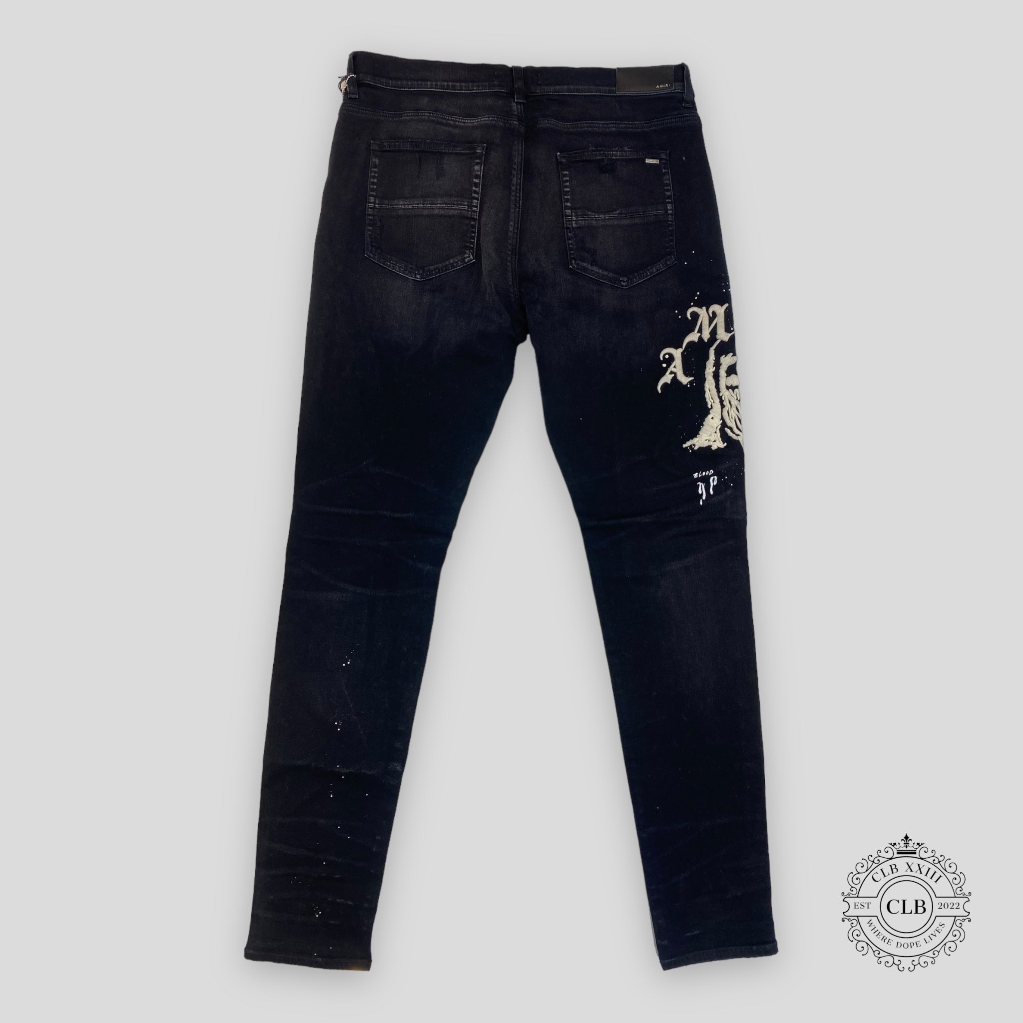 JEANS AMIRI X WES LANG REAPER AVEC LOGO - NOIR VIEILLI