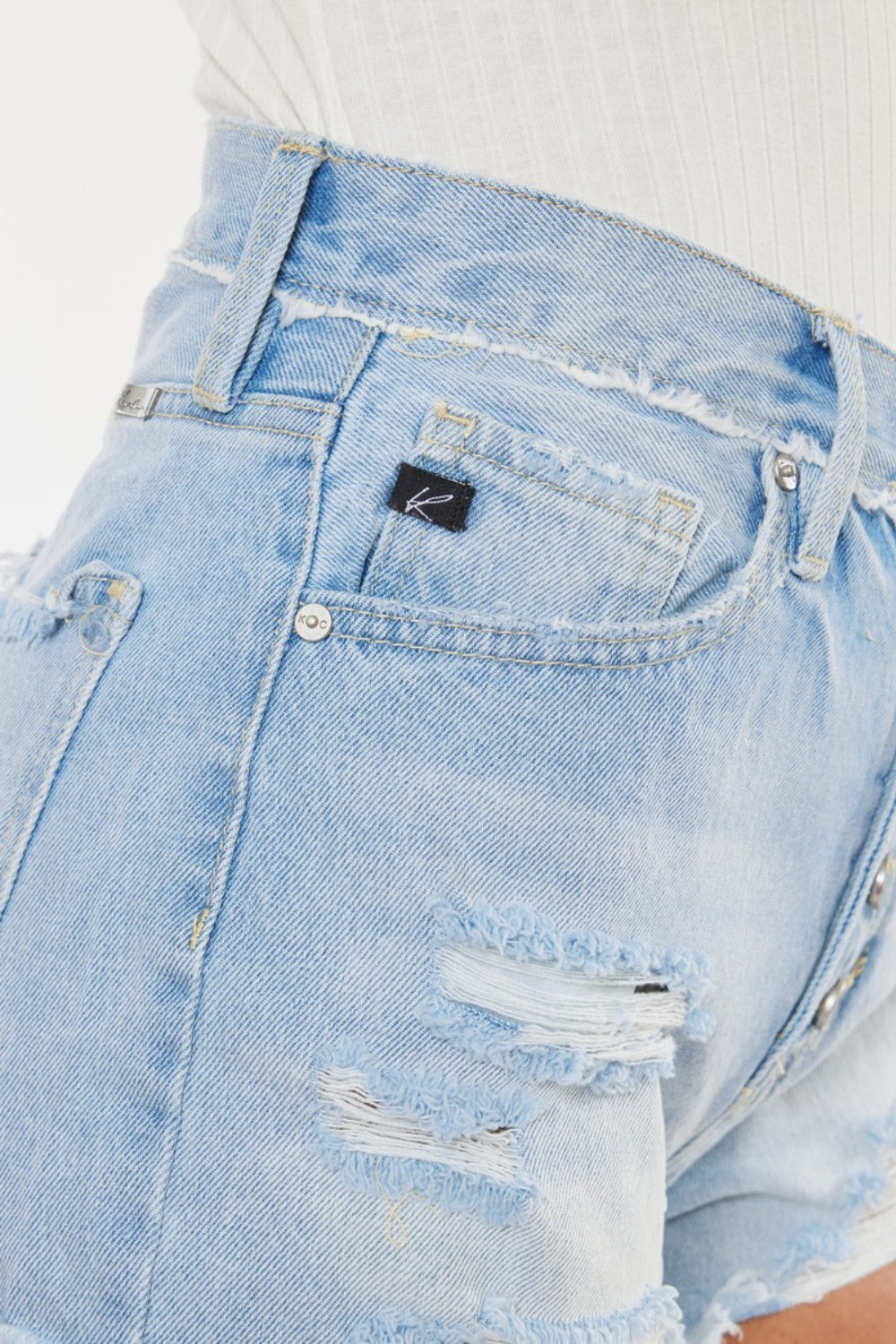 Short en jean bleu délavé à braguette boutonnée