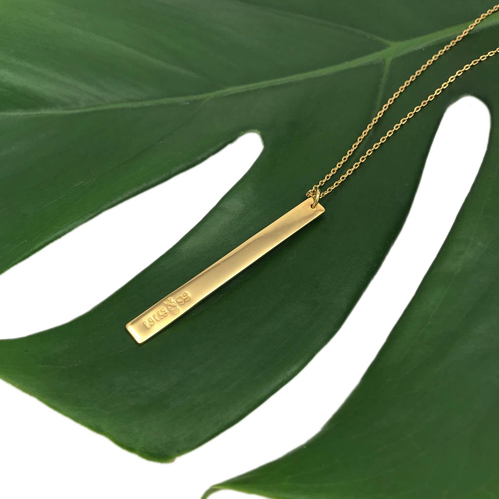 Collier superposé à barre et à balle
