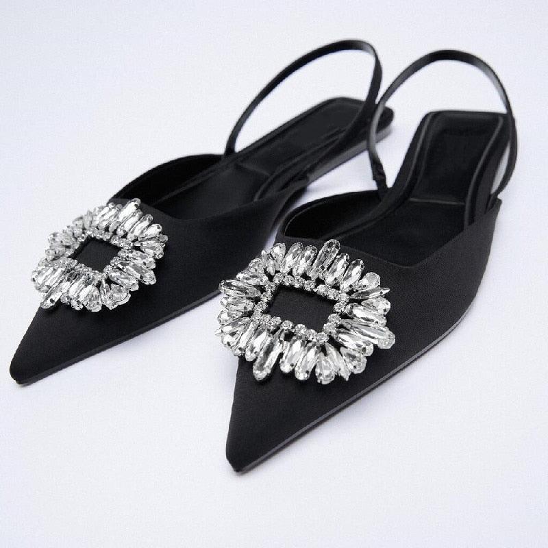 Chaussures plates pour femmes de luxe avec brides noires et talons bas d'été beiges, bout pointu fermé, strass et bande élastique, mules plates et pantoufles de marche extérieures.