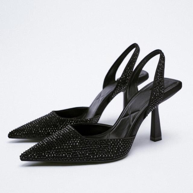 Chaussures plates pour femmes de luxe avec brides noires et talons bas d'été beiges, bout pointu fermé, strass et bande élastique, mules plates et pantoufles de marche extérieures.