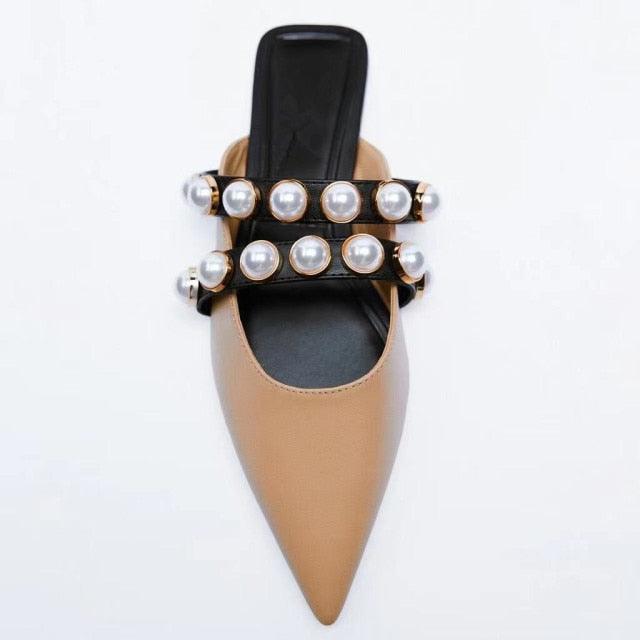 Chaussures plates pour femmes de luxe avec brides noires et talons bas d'été beiges, bout pointu fermé, strass et bande élastique, mules plates et pantoufles de marche extérieures.