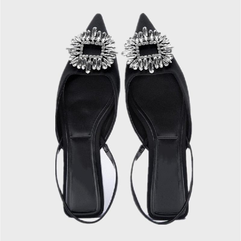 Chaussures plates pour femmes de luxe avec brides noires et talons bas d'été beiges, bout pointu fermé, strass et bande élastique, mules plates et pantoufles de marche extérieures.