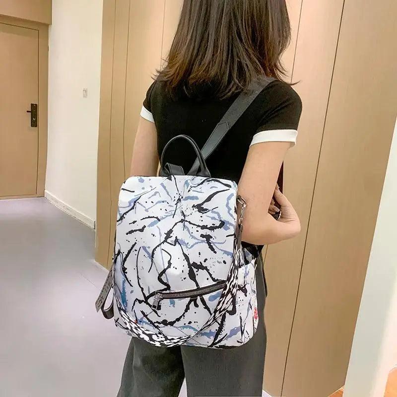 Sac à dos moderne élégant imperméable pour femme, sac à dos antivol tendance avec joli imprimé, sac d'école de haute qualité grande capacité