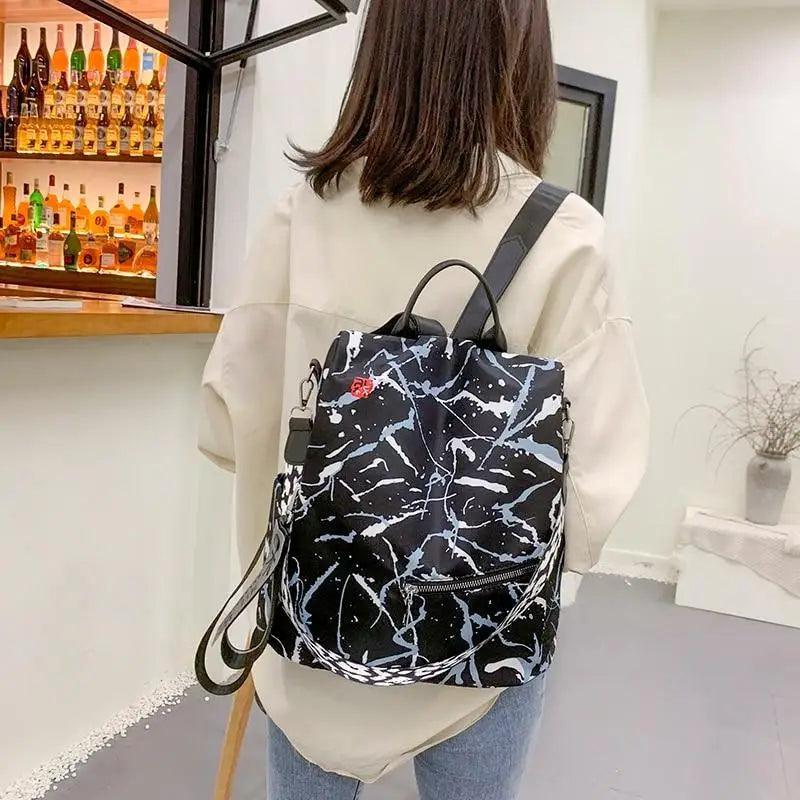 Sac à dos moderne élégant imperméable pour femme, sac à dos antivol tendance avec joli imprimé, sac d'école de haute qualité grande capacité