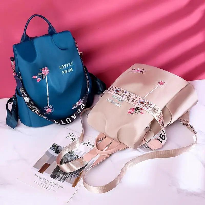 Sac à dos moderne élégant imperméable pour femme, sac à dos antivol tendance avec joli imprimé, sac d'école de haute qualité grande capacité