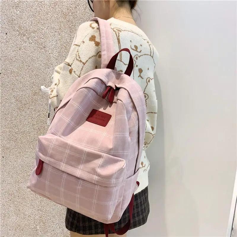 Nouveau sac à dos décontracté pour femmes et filles Sac à dos élégant à rayures pour adolescentes