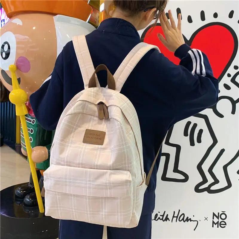 Nouveau sac à dos décontracté pour femmes et filles Sac à dos élégant à rayures pour adolescentes