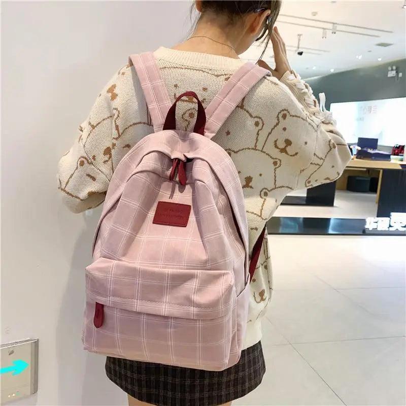 Nouveau sac à dos décontracté pour femmes et filles Sac à dos élégant à rayures pour adolescentes