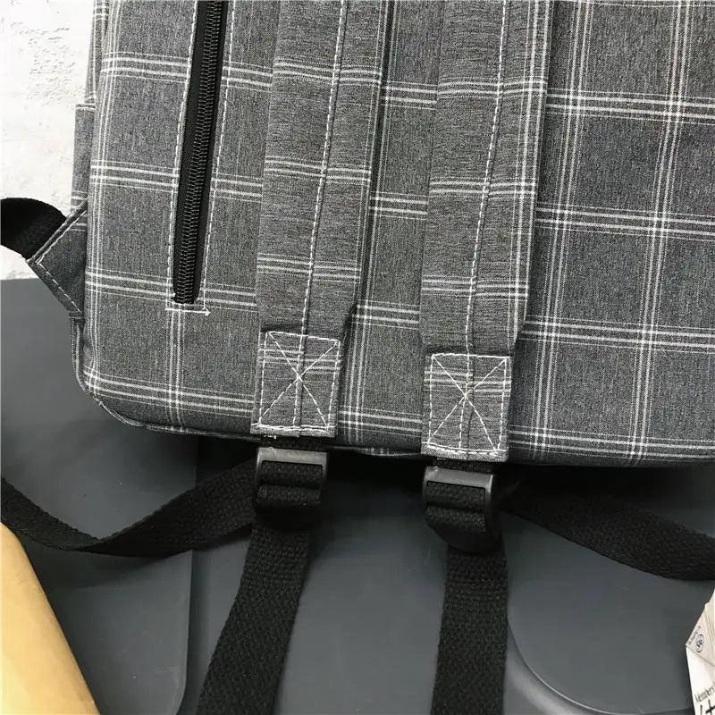 Nouveau sac à dos décontracté pour femmes et filles Sac à dos élégant à rayures pour adolescentes