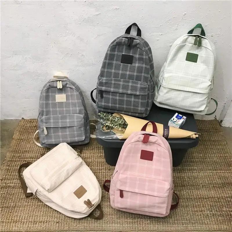 Nouveau sac à dos décontracté pour femmes et filles Sac à dos élégant à rayures pour adolescentes