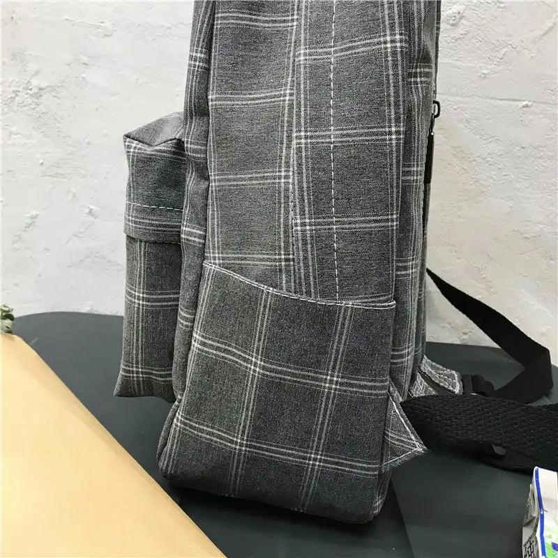 Nouveau sac à dos décontracté pour femmes et filles Sac à dos élégant à rayures pour adolescentes