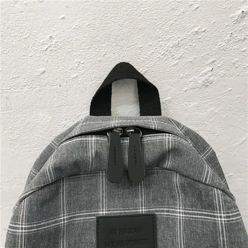 Nouveau sac à dos décontracté pour femmes et filles Sac à dos élégant à rayures pour adolescentes