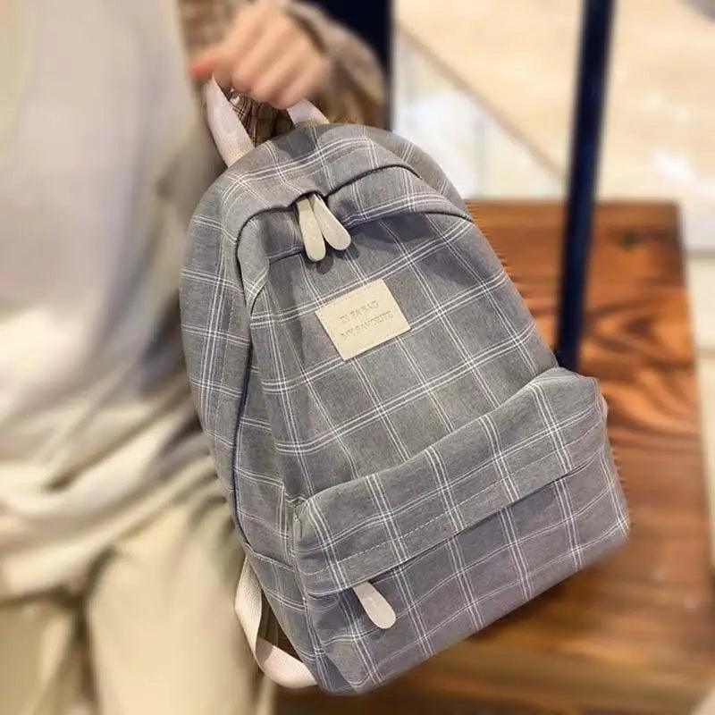Nouveau sac à dos décontracté pour femmes et filles Sac à dos élégant à rayures pour adolescentes