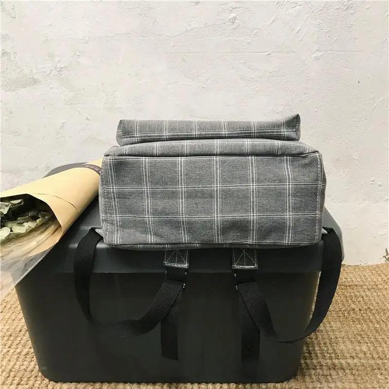 Nouveau sac à dos décontracté pour femmes et filles Sac à dos élégant à rayures pour adolescentes