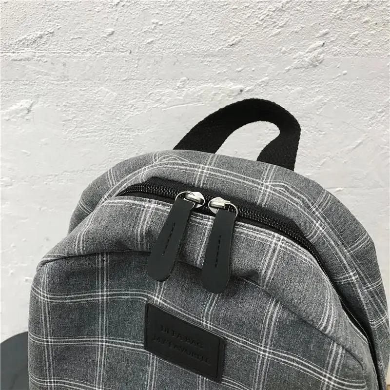Nouveau sac à dos décontracté pour femmes et filles Sac à dos élégant à rayures pour adolescentes