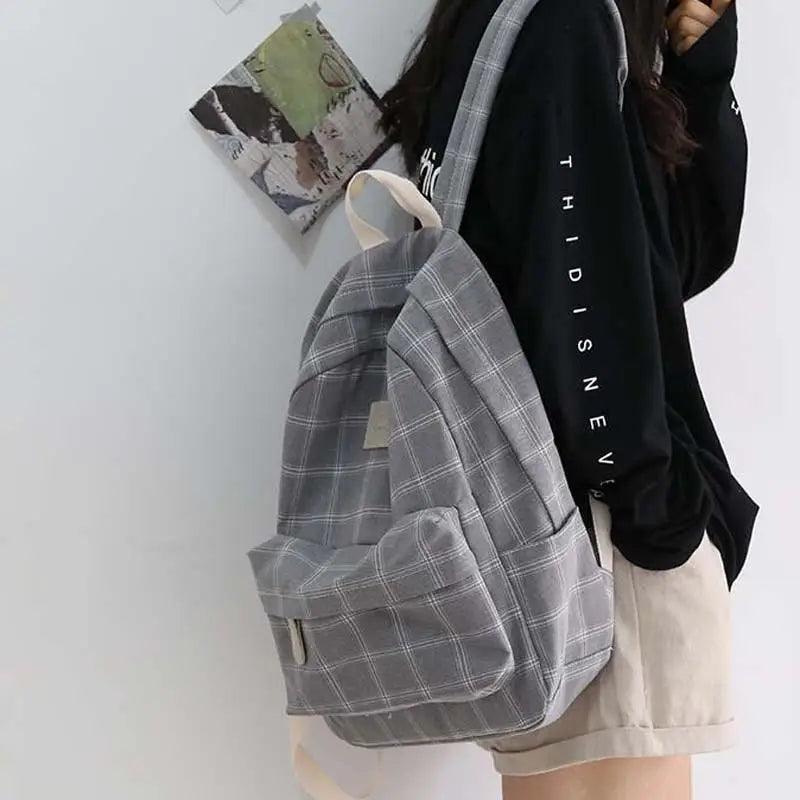 Nouveau sac à dos décontracté pour femmes et filles Sac à dos élégant à rayures pour adolescentes
