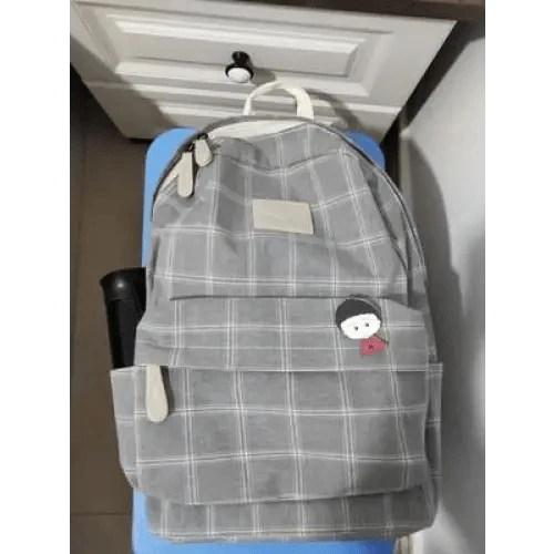 Nouveau sac à dos décontracté pour femmes et filles Sac à dos élégant à rayures pour adolescentes