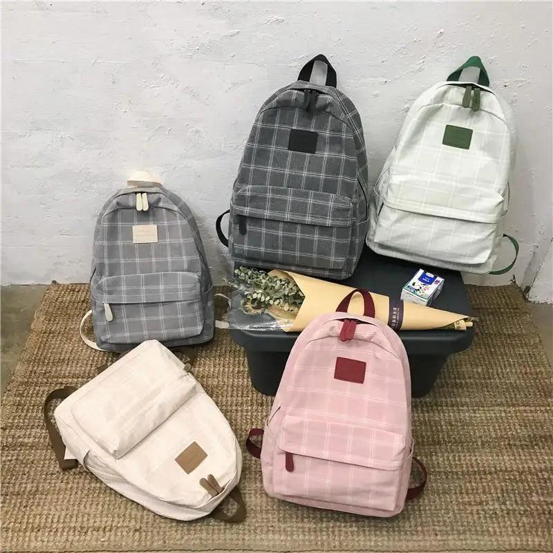Nouveau sac à dos décontracté pour femmes et filles Sac à dos élégant à rayures pour adolescentes