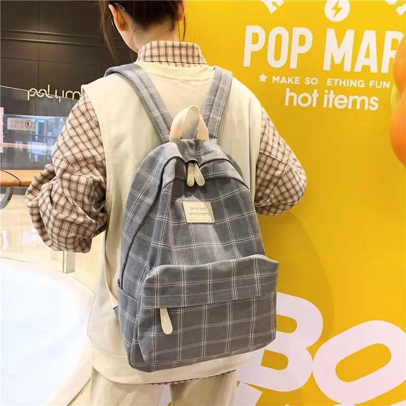 Nouveau sac à dos décontracté pour femmes et filles Sac à dos élégant à rayures pour adolescentes