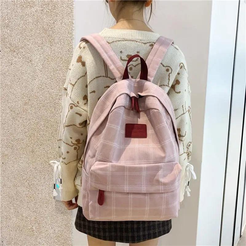 Nouveau sac à dos décontracté pour femmes et filles Sac à dos élégant à rayures pour adolescentes