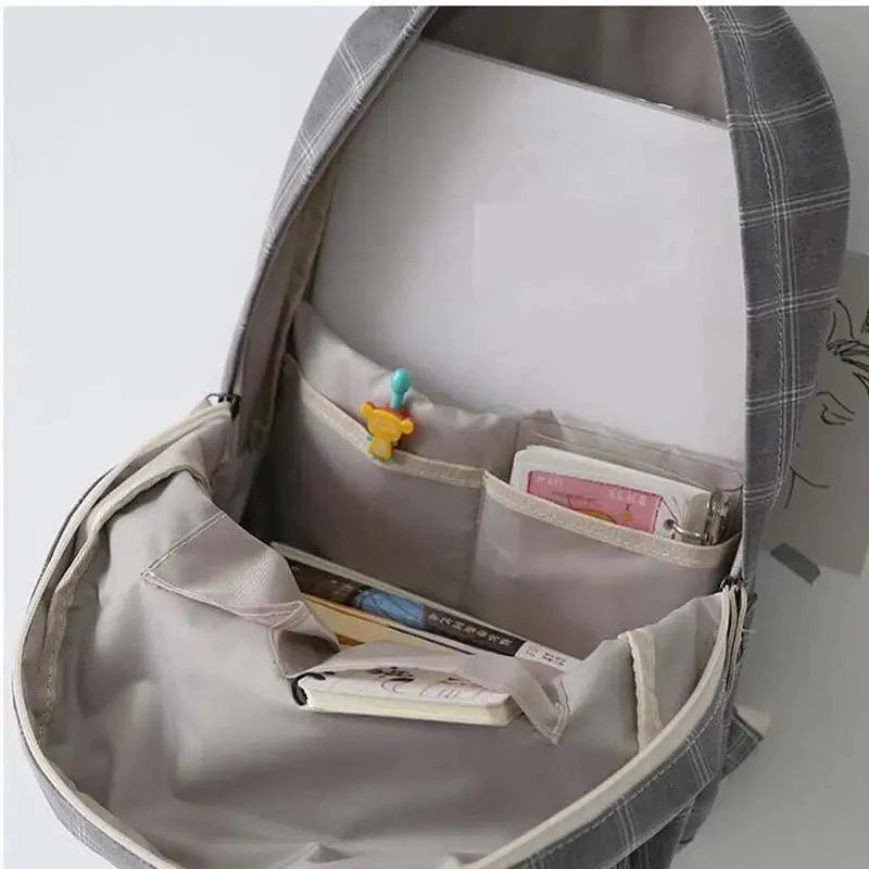 Nouveau sac à dos décontracté pour femmes et filles Sac à dos élégant à rayures pour adolescentes