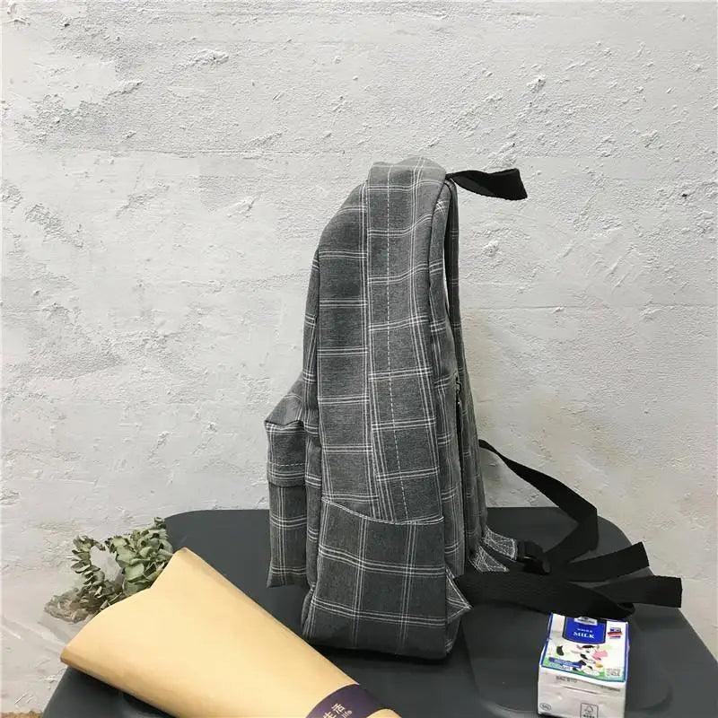 Nouveau sac à dos décontracté pour femmes et filles Sac à dos élégant à rayures pour adolescentes