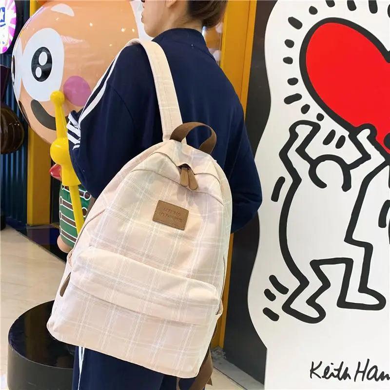 Nouveau sac à dos décontracté pour femmes et filles Sac à dos élégant à rayures pour adolescentes