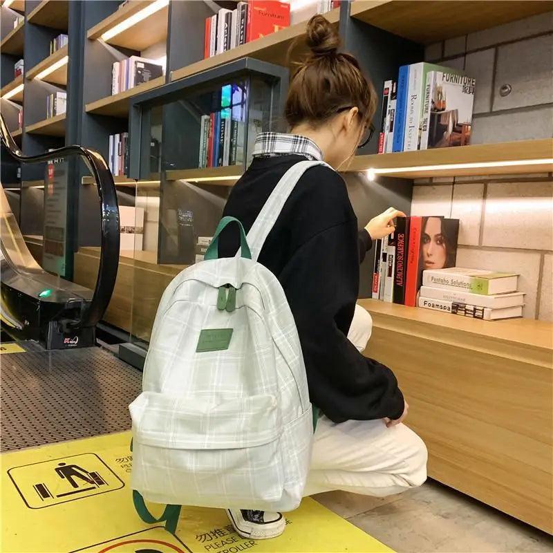 Nouveau sac à dos décontracté pour femmes et filles Sac à dos élégant à rayures pour adolescentes