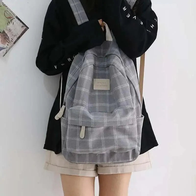 Nouveau sac à dos décontracté pour femmes et filles Sac à dos élégant à rayures pour adolescentes