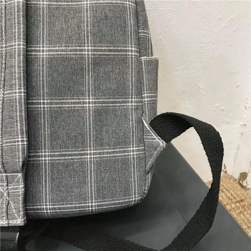 Nouveau sac à dos décontracté pour femmes et filles Sac à dos élégant à rayures pour adolescentes