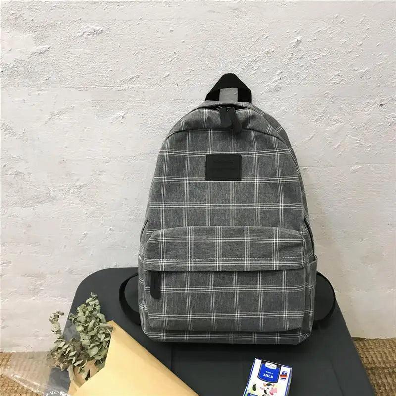 Nouveau sac à dos décontracté pour femmes et filles Sac à dos élégant à rayures pour adolescentes
