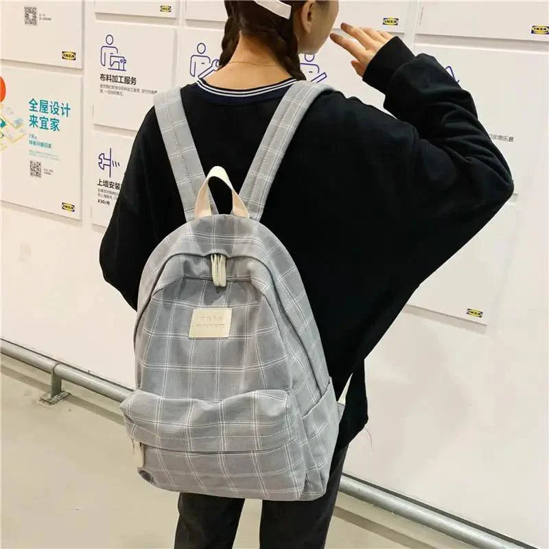 Nouveau sac à dos décontracté pour femmes et filles Sac à dos élégant à rayures pour adolescentes