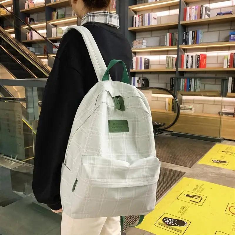 Nouveau sac à dos décontracté pour femmes et filles Sac à dos élégant à rayures pour adolescentes