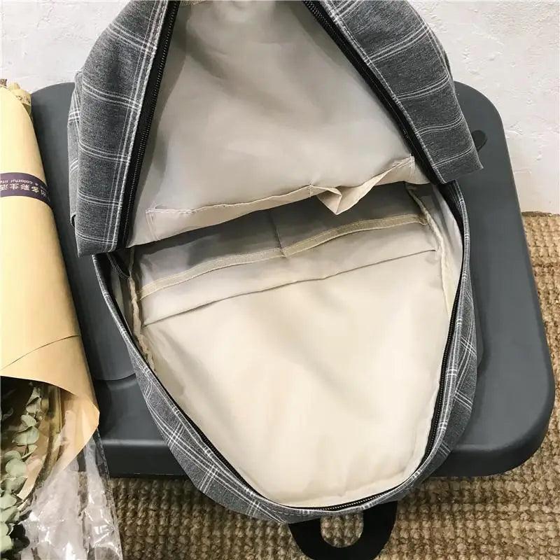 Nouveau sac à dos décontracté pour femmes et filles Sac à dos élégant à rayures pour adolescentes